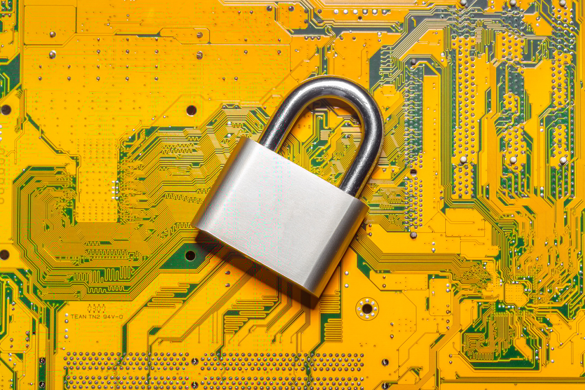 padlock on a computer circuit board